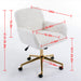 Giga swivel office chair with artificial rabbit hair upholstery, metal base, adjustable height, and swivel function for home or vanity use.