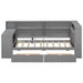 Giga platform storage bed with upholstered headboard, built-in desk, shelves, drawers, charging station, and LED lighting in a modern bedroom.