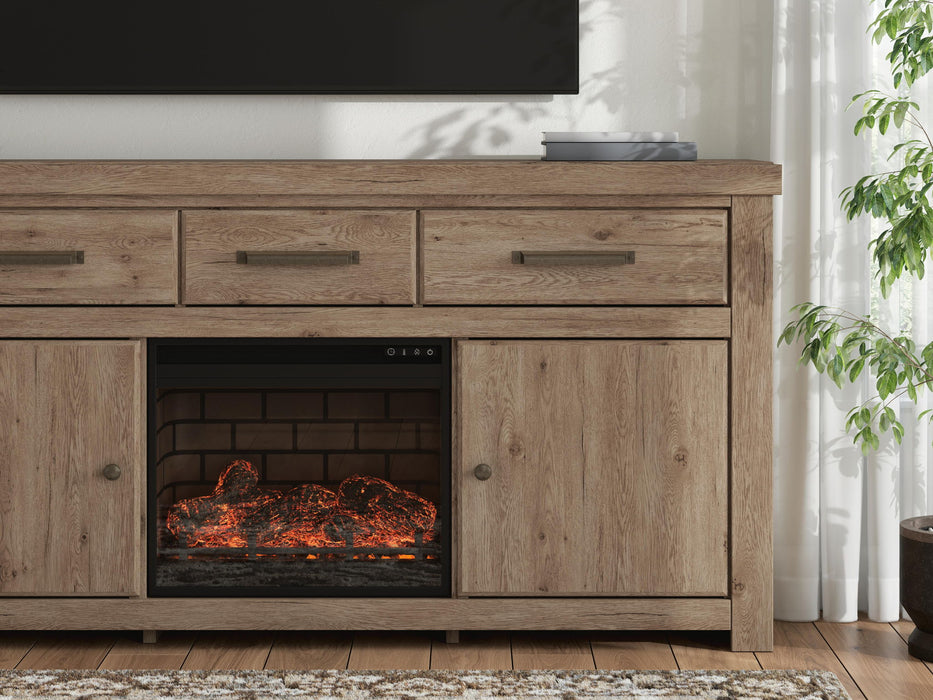 Signature Design by Ashley Garistyn TV stand with built-in fireplace, wood finish, and storage cabinets for modern living rooms.