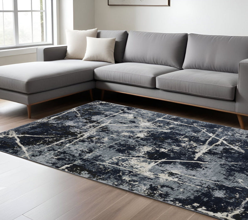 6.6' x 9.7' Abstract Power Loom Stain Resistant Area Rug - Blue Grey And Beige
