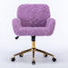 Giga swivel office chair with artificial rabbit hair upholstery, metal base, adjustable height, and swivel function for home or vanity use.