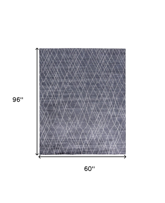 5' x 8' Abstract Hand Woven Viscose Area Rug - Blue And Ivory