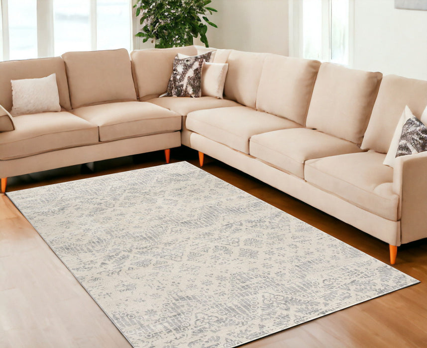 8' x 11' Distressed Ikat Pattern Area Rug - Ivory
