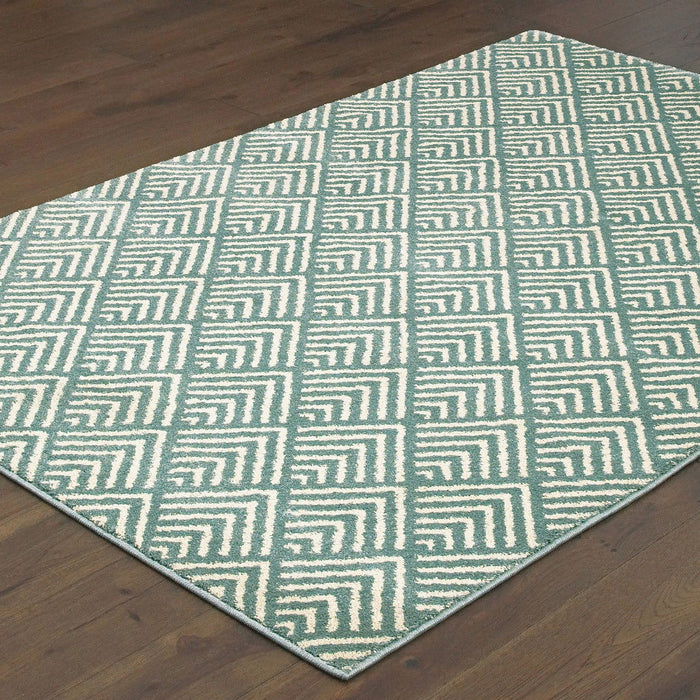 10' x 13' Geometric Power Loom Stain Resistant Area Rug - Foam Blue And Ivory