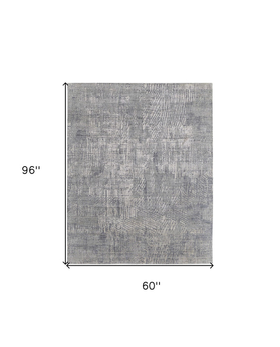 5' x 8' Casual Abstract Hand Woven Worn Faded Area Rug - Gray