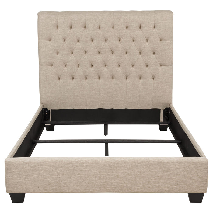 Chloe upholstered full panel bed in oatmeal fabric with a padded headboard, wooden side panels, and modern furniture design.