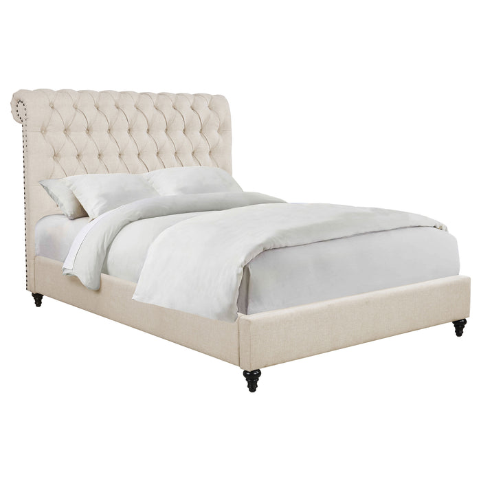 Beige upholstered Queen panel bed from CoasterEssence with a sleek, modern design and a sturdy wooden frame.
