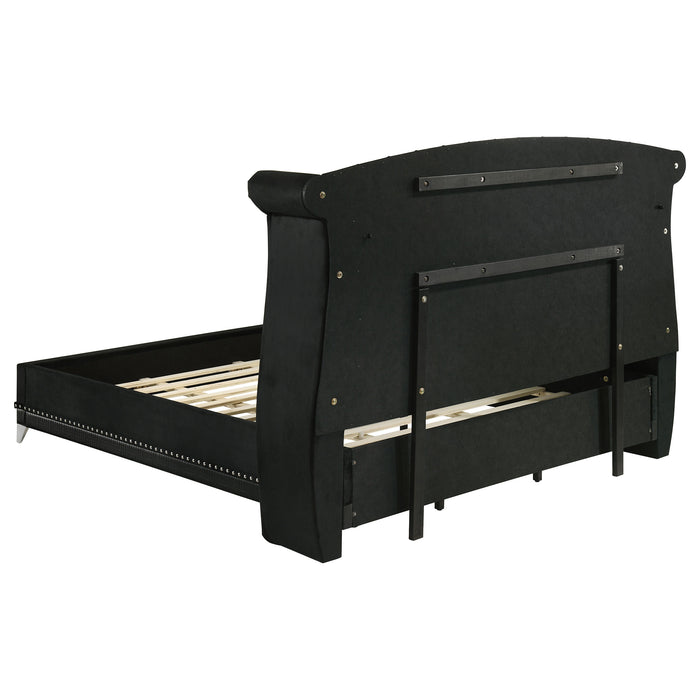 Black upholstered Eastern King Wingback Bed by CoasterElevations with high headboard and winged sides, modern furniture design.