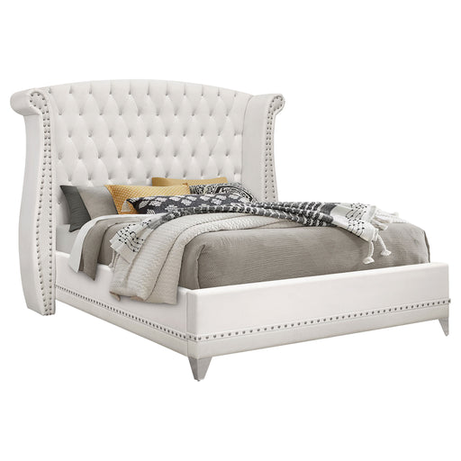 White Barzini upholstered California King wingback bed with tufted headboard and sturdy frame, designed for elegant bedroom decor.
