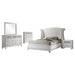 CoasterEveryday Barzini 5-piece Queen bedroom set in white with a bed frame, nightstands, and dresser displayed in a modern bedroom.