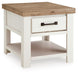 Rectangular cocktail table from Signature Design by Ashley®, featuring a sleek wooden top and modern metal legs.