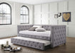 CoasterEssence Mockern upholstered twin daybed with grey fabric, includes a trundle and wooden legs, ideal for a modern bedroom.