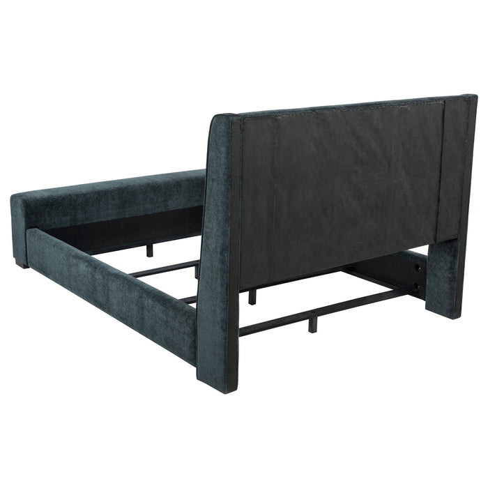 Dark blue Preston upholstered California King Audio Flame Visualizer Bed by CoasterEveryday, showcasing plush fabric and elegant design.