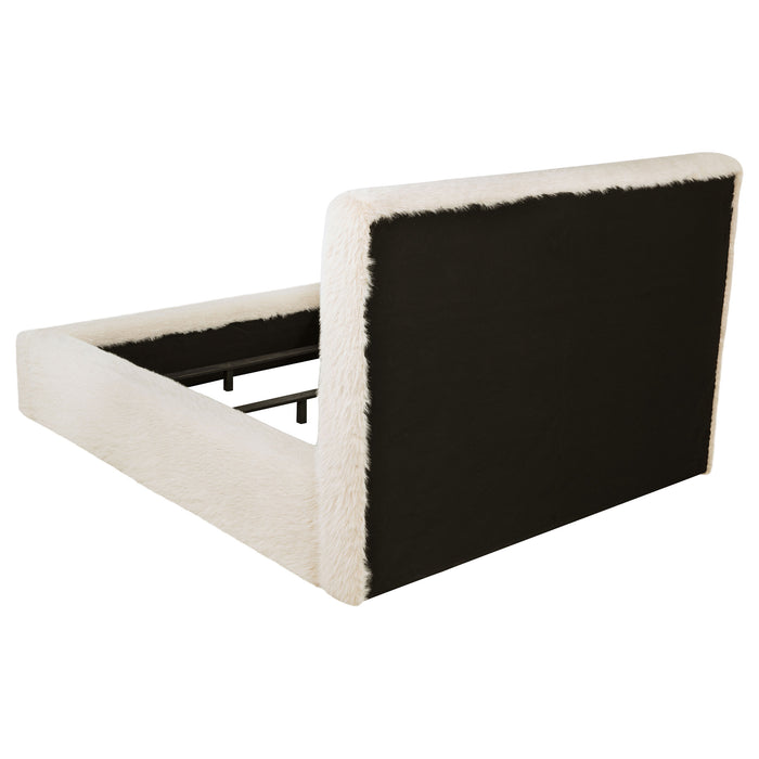 Cream Rebecca Faux Fur Upholstered California King Bed by CoasterEveryday with plush fabric and elegant headboard design.