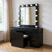Black 62-inch wood and glass vanity set with six drawers, mirror, seating, and built-in lights by HomeRoots.