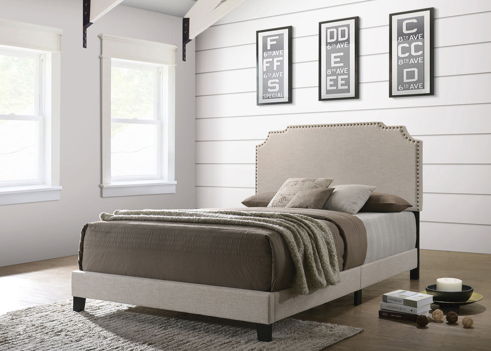 Beige upholstered Tamarac Queen Panel Bed by CoasterEveryday with a clean, modern design and sturdy wooden frame.