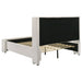 White Alamosa Boucle Upholstered Queen Wingback Bed by CoasterEveryday with tufted headboard and wooden legs.