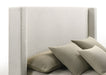 White Alamosa Boucle Upholstered Queen Wingback Bed by CoasterEveryday with tufted headboard and elegant wingback design.