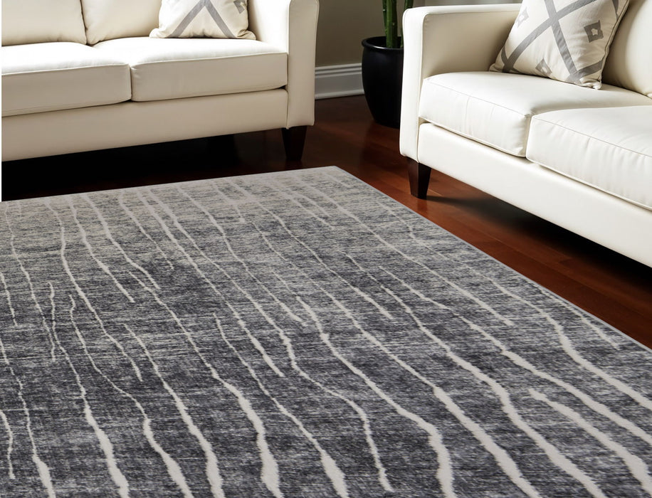 7' X 10' Abstract Power Loom Area Rug - Ivory And Black