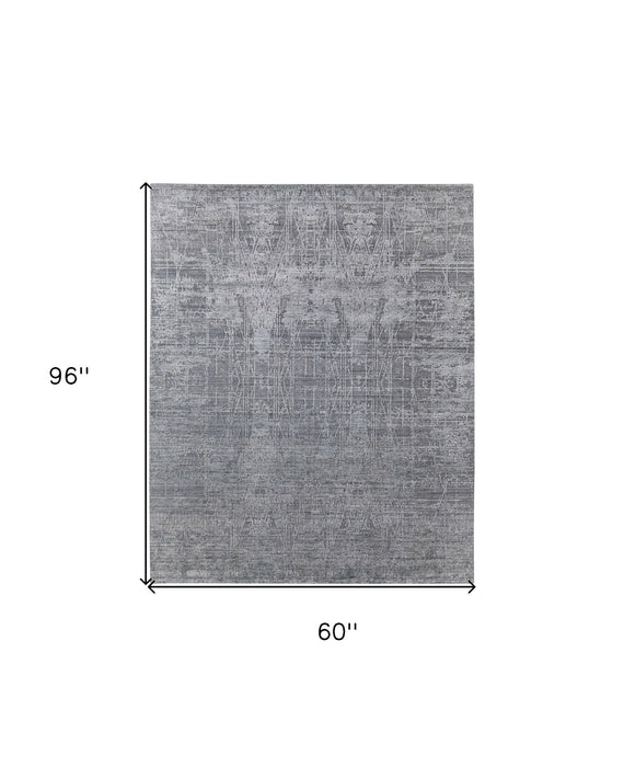5' x 8' Casual Abstract Hand Woven Worn Faded Wool Blend Area Rug - Gray