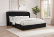 Black Blaire upholstered California King wingback platform bed with tufted headboard and sleek design, by CoasterEveryday.