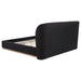 Black Blaire upholstered California King wingback platform bed from CoasterEveryday, with tall wingback headboard and sleek design.
