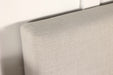 CoasterEveryday Pirro upholstered king panel headboard in soft sand fabric, featuring a padded, modern furniture design for bedroom decor.