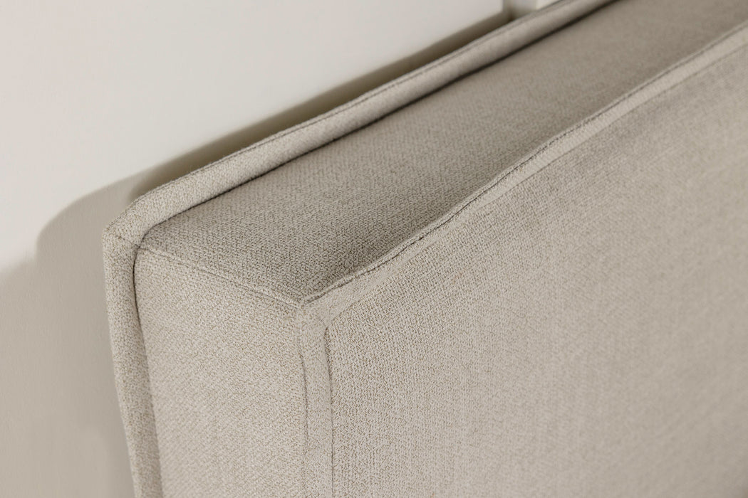 Sand upholstered queen or full panel headboard from CoasterEveryday, showcasing a padded, tufted fabric design with a sleek frame.