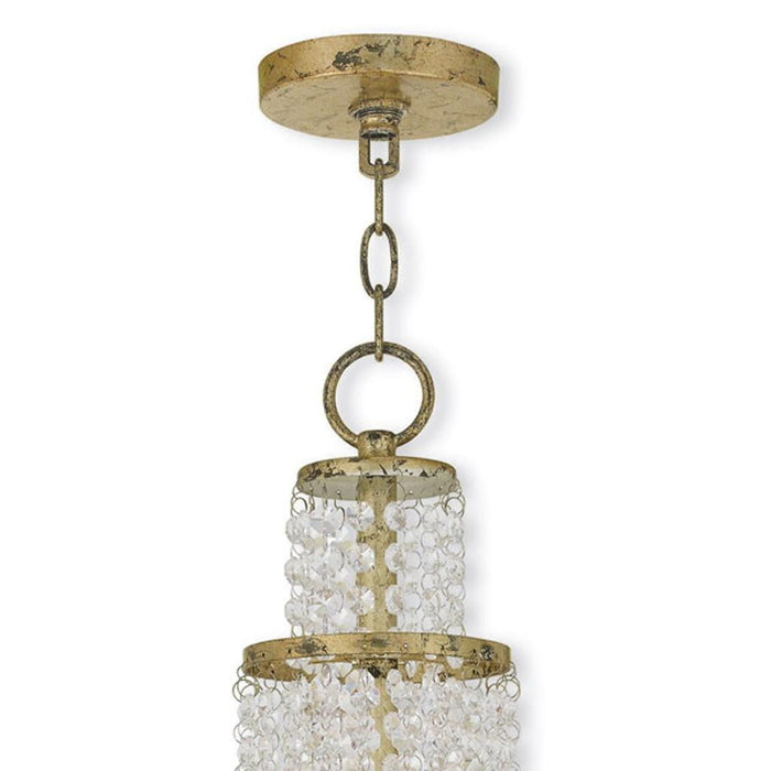HomeRoots 22-inch metal chandelier with three lights, shades, and dimmable feature in gold, clear, and off-white colors.