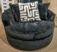 Signature Design by Ashley Ashford Heights oversized swivel accent chair in onyx upholstery