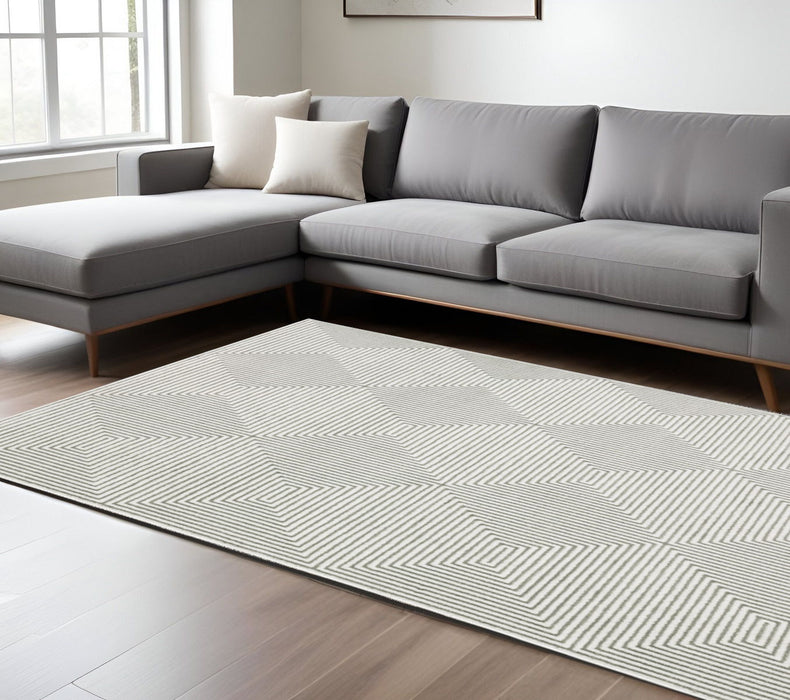 6.6' x 9.7' Geometric Power Loom Area Rug - Gray And White