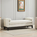 Elegant ivory boucle upholstered bench with wood legs and bolster pillows, serving as a daybed or ottoman by Giga.
