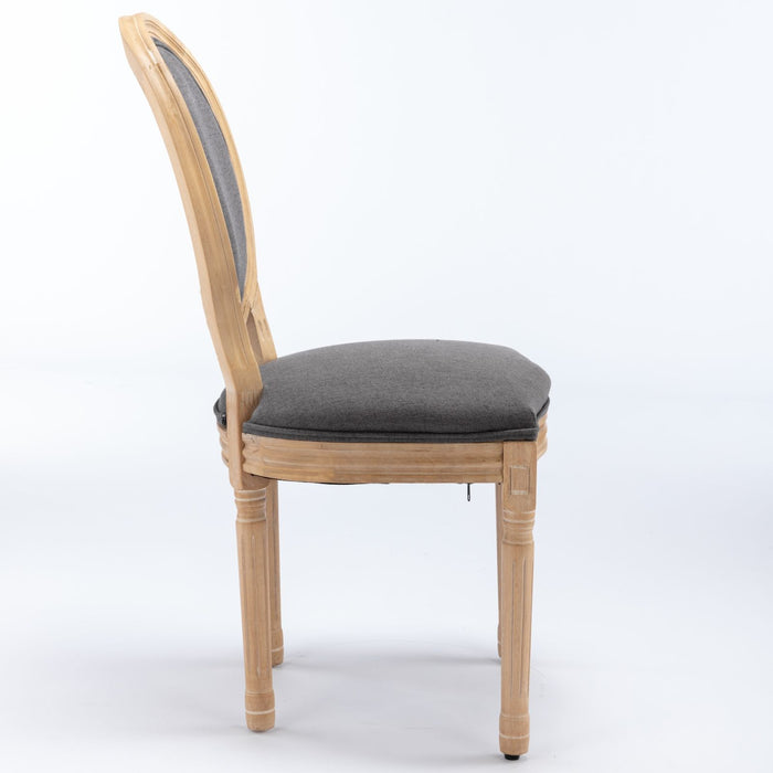 Set of 2 Giga French style solid wood dining chairs with antique fabric backrests and wooden frames.