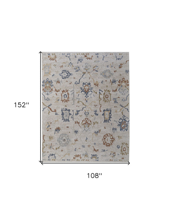 9' x 13' Floral Power Loom Worn Faded Area Rug With Fringe - Ivory Blue And Gold