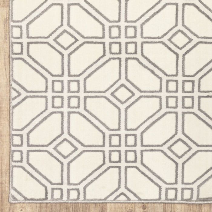 9.8' x 12.8' Geometric Power Loom Stain Resistant Area Rug - Ivory And Grey
