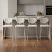 Set of four light gray fabric faux leather counter height bar stools by HomeRoots with modern design and sturdy metal legs.