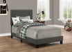 CoasterEveryday Boyd upholstered twin panel bed in charcoal fabric with a padded headboard and footboard