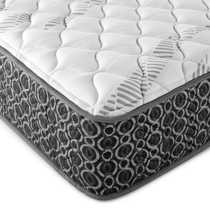 CoasterEveryday Hayes Full Firm Tight Top Hybrid Mattress in white, showing a close-up of the mattress surface and texture.