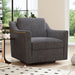 Giga 360-degree swivel armchair with skin-friendly fabric, ergonomic design, brass nail accents, and a modern, comfortable look.
