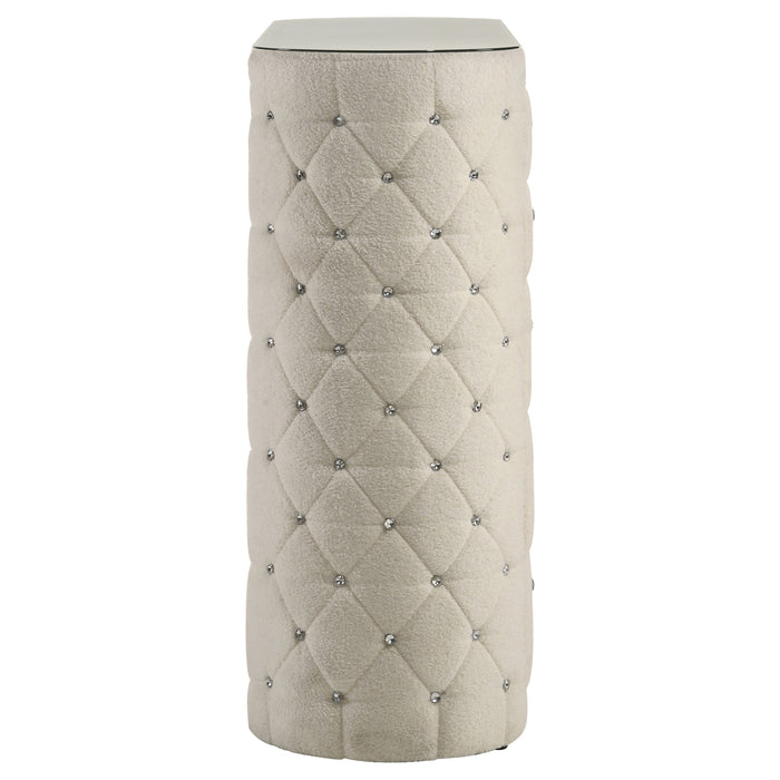 Sonya ivory 5-drawer upholstered bedroom chest of drawers from CoasterEveryday, showing smooth fabric upholstery and multiple drawers.