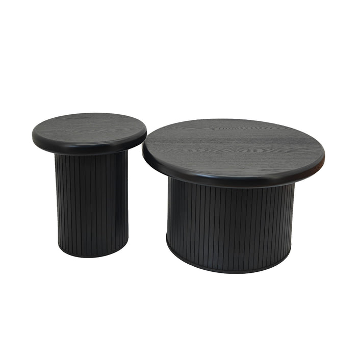 Set of two black Giga fluted cylinder side tables with round tops, ideal for living room decor.