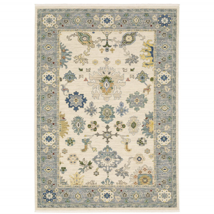 8' x 11' Oriental Power Loom Stain Resistant Area Rug With Fringe - Ivory Blue Gray Teal Gold Green And Rust