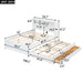 White Giga full size platform bed with trundle, built-in shelves, drawers, and USB ports, shown with mattress and bedding.