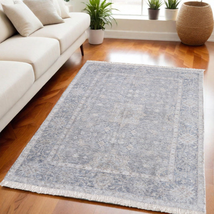 5' X 8' Bohemian Abstract Hand Woven Distressed Area Rug With Fringe - Gray