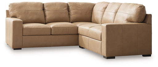 Signature Design by Ashley Bandon 2-Piece Stationary Sectional with plush fabric, featuring wide cushions and modern design.
