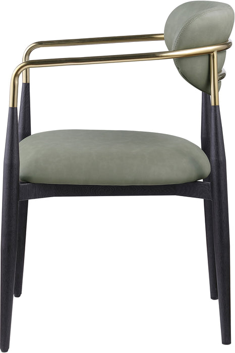 Black-legged Meridian Furniture Ronda vegan leather upholstered dining arm chair with plush seat and backrest.