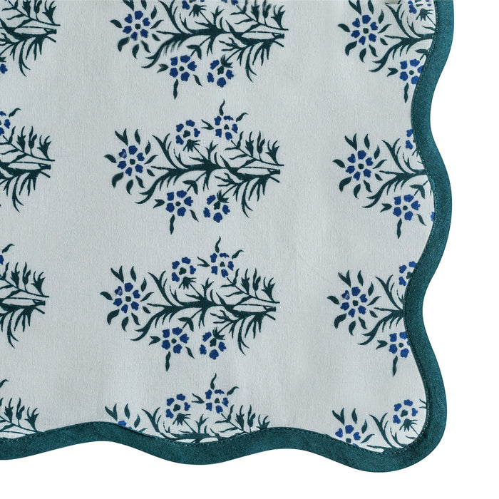 Set of four TOV Furniture Crissy Cotton Canvas Printed Napkins in blue cornflower with floral pattern.