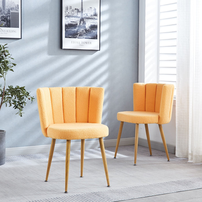 Set of 2 Giga modern dining chairs with wood-colored iron tube legs, shorthair cushions, and supportive backrests.
