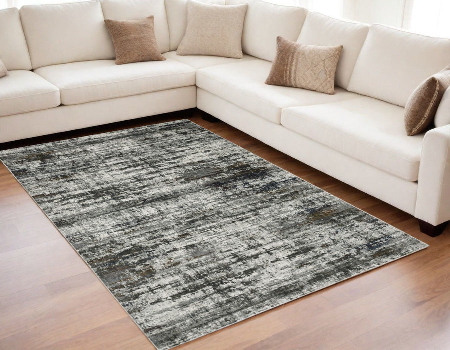 5' x 8' Abstract Power Loom Stain Resistant Area Rug - Ivory Charcoal Gray Blue Rust And Brown