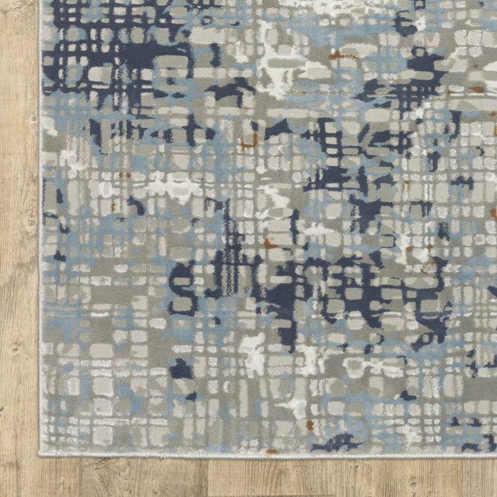 10' x 13' Abstract Power Loom Stain Resistant Area Rug - Blue Ivory Gray Brown Beige And Light Blue